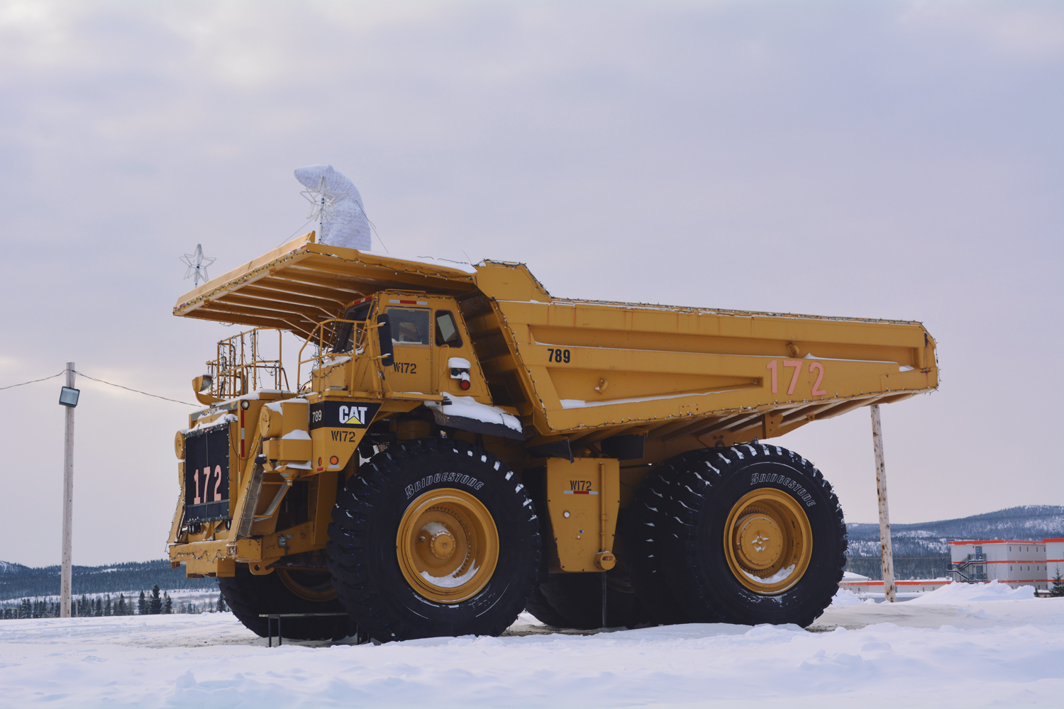 A 190 tons mining dump truck symbolizes the city of Fermont (QC)